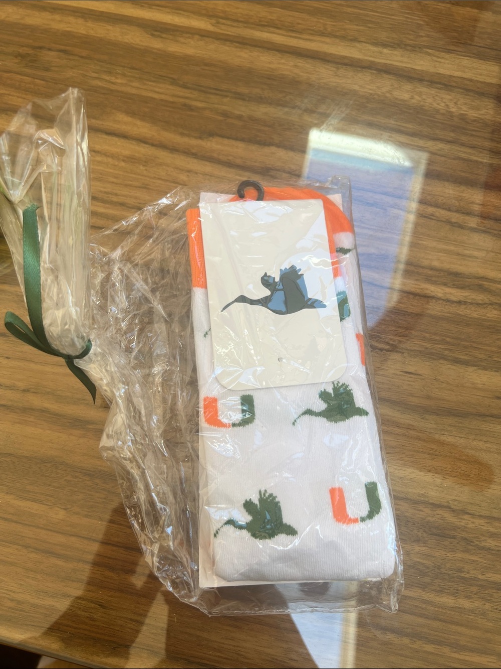 White Socks with Green and Orange U Miami print, 100 year celebration